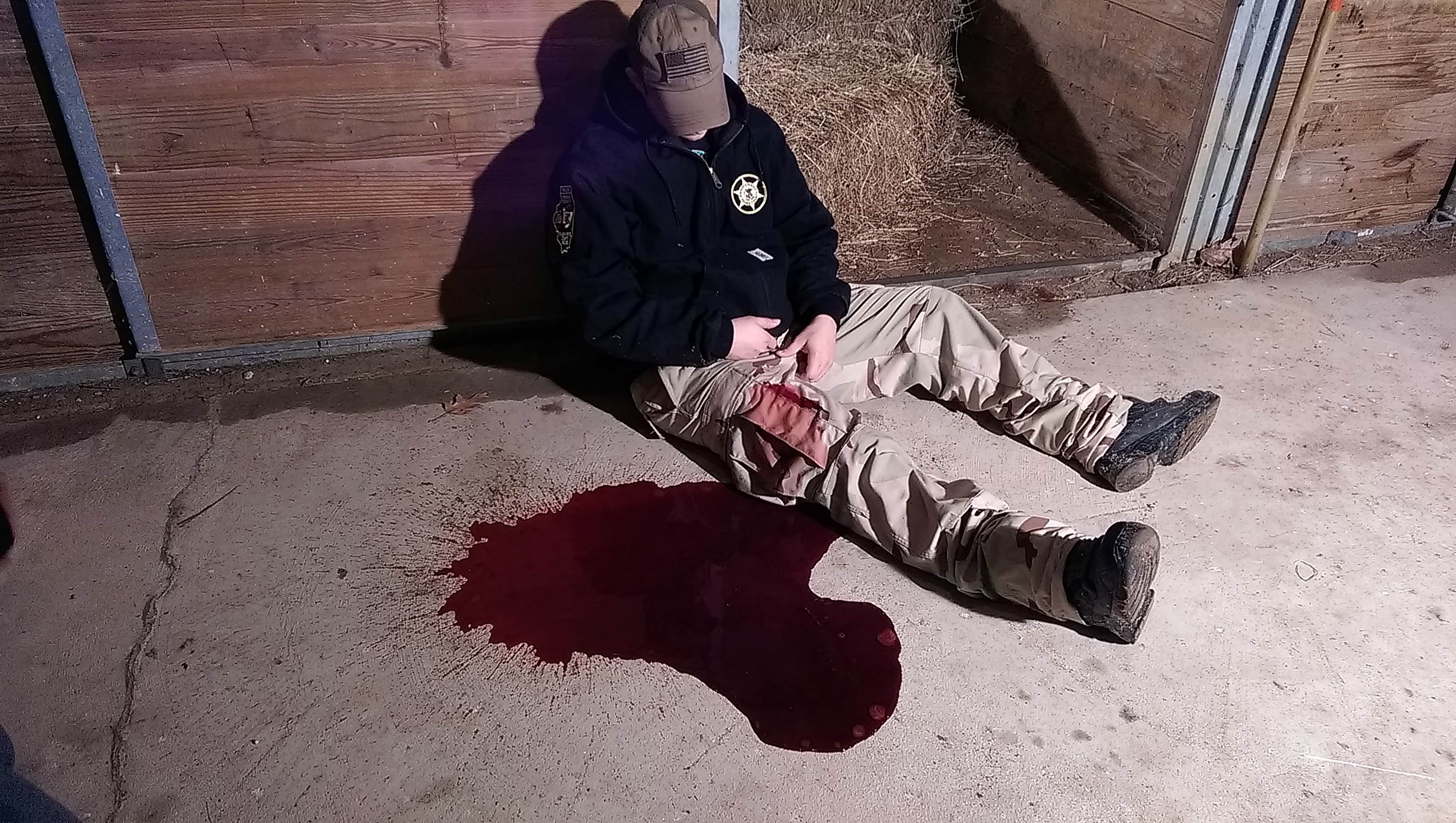 TacMedPic 4-6428-simulated downed LEO with 1000 cc of pooled blood.jpg